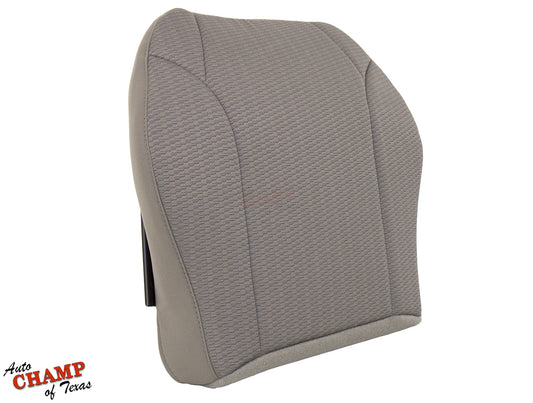 Side view of a replacement driver-side bottom cloth seat cover in taupe for 2002-2004 Jeep Liberty.