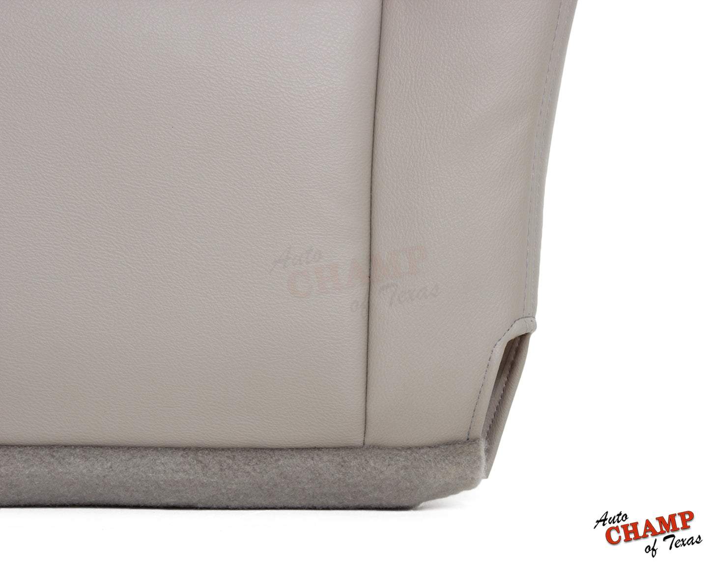 Close-up view of the bottom section of the 2005-2006 Toyota Tundra Limited SR5 Driver Side Bottom Replacement Leather Seat Cover in Tan, showing the leather texture and stitching.
