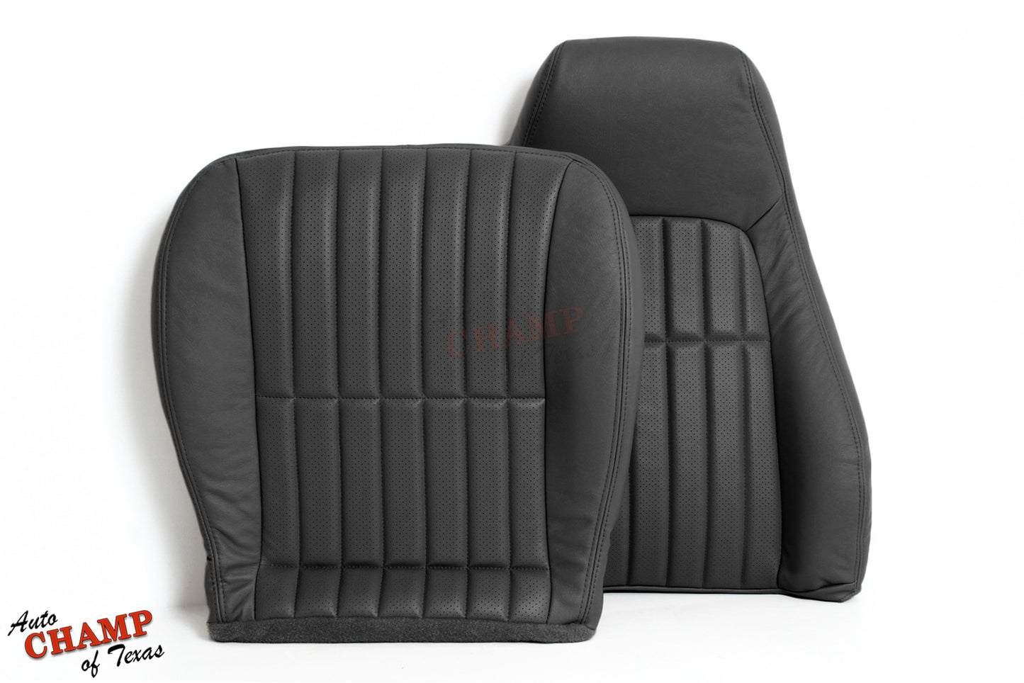Black leather seat cover set with vertical stitching and perforated design.
