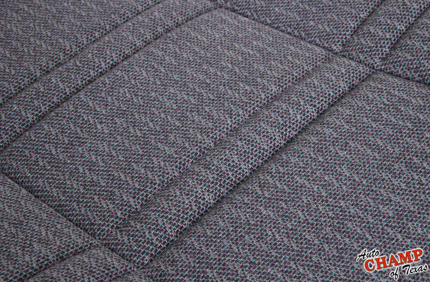 Close-up texture of 1999-2001 Jeep Cherokee Sport SE dark gray seat fabric.