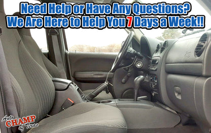 Interior view of a 2002-2004 Jeep Liberty with cloth seats and dashboard details.