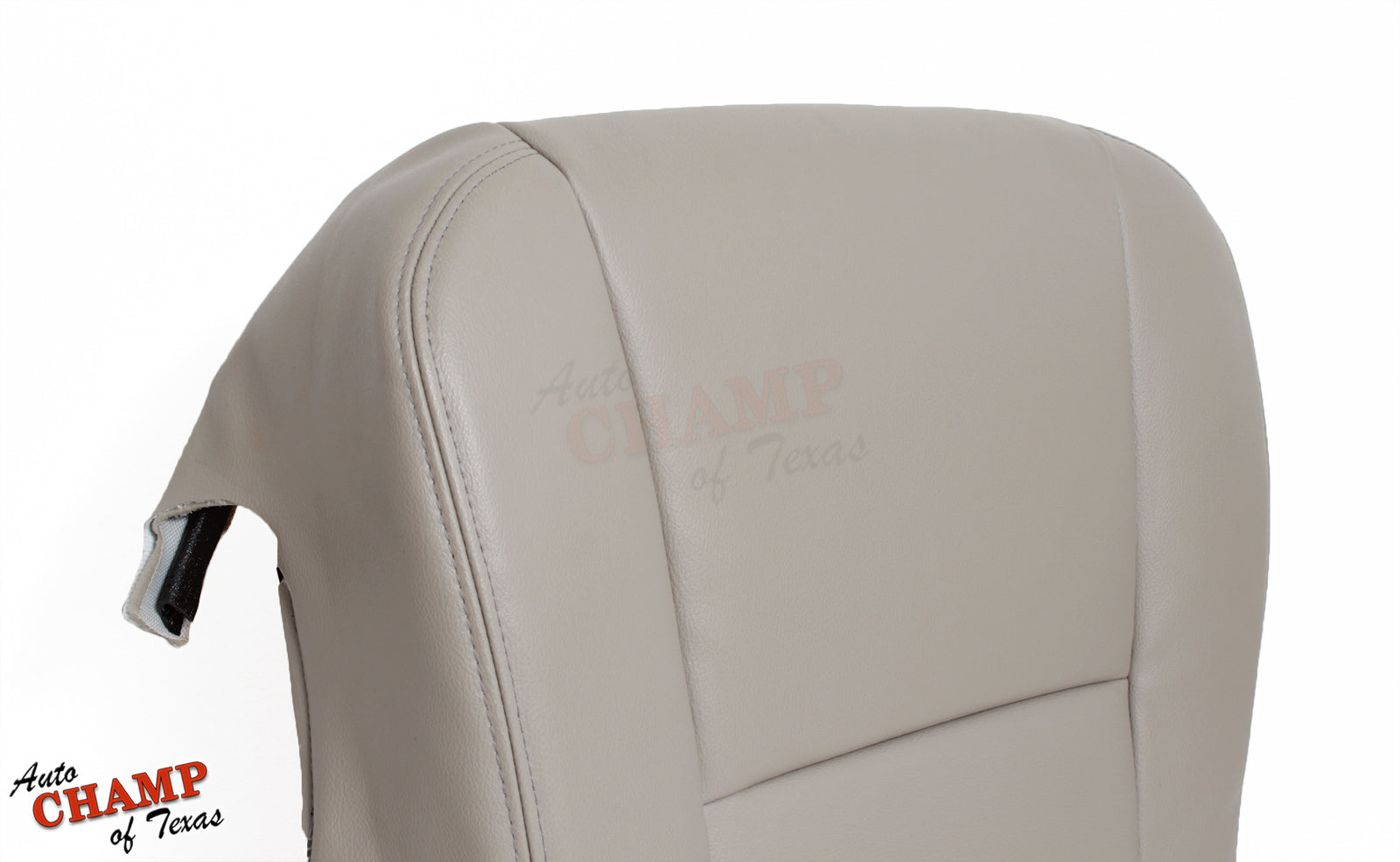 Close-up view of the top part of the 2005-2006 Toyota Tundra Limited SR5 Driver Side Bottom Replacement Leather Seat Cover in Tan, showing the leather texture and seam.