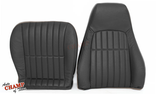 Passenger side replacement leather seat covers in dark gray with a perforated design.