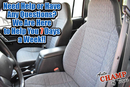 Gray cloth seat cover installed on driver-side seat in a vehicle interior.